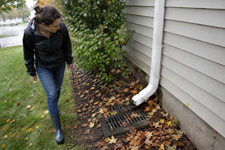 Stormwater maintenance belongs on every property care calendar because runoff follows the path of least resistance. When gutters overflow, soil washes from a slope, or a drain opening fills